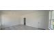 Spacious bedroom with gray wood-look flooring and ample natural light at 13420 Sw 77Th Ave, Ocala, FL 34473