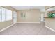 Spacious living room with neutral walls, tile flooring, and a bright atmosphere at 1408 Watts Ave, Orlando, FL 32809