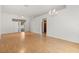 Spacious living room with hardwood floors, sliding doors and an overhead fan at 1415 Hensley Dr, Deland, FL 32724