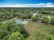 An aerial view of the community's recreation area featuring pickleball, basketball, and grassy fields at 148 Tarrytown Trl, Longwood, FL 32750