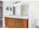 Bathroom featuring double sinks, vanity, and showerhead for a functional space at 148 Tarrytown Trl, Longwood, FL 32750