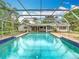 Inviting screened-in pool with connecting patio and an exterior view of the home at 148 Tarrytown Trl, Longwood, FL 32750