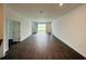 Bright and airy living room with sliding glass doors that lead to the back patio at 1590 Contentment Loop, Kissimmee, FL 34744