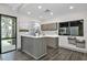 Community lobby featuring a service desk, modern cabinets, tile floors, and outside views at 1590 Contentment Loop, Kissimmee, FL 34744