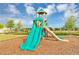 Community playground with a colorful slide and climbing structure at 1590 Contentment Loop, Kissimmee, FL 34744