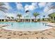 Gathering-friendly pool area with splash features and plenty of seating at 1590 Contentment Loop, Kissimmee, FL 34744