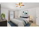 Stylishly decorated bedroom featuring a comfortable bed, tasteful decor, and plenty of natural light at 1621 Sunny St, Kissimmee, FL 34741