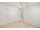 Spacious bedroom with tile flooring and closet space at 1621 Sunny St, Kissimmee, FL 34741