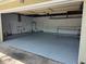 This is a clean and spacious garage with painted floors at 1695 E Horatio Ave, Maitland, FL 32751