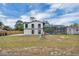 Two-story home with a fenced yard and screened pool at 1840 Lillian Dr, St Cloud, FL 34771