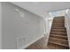 Hallway with a staircase and access to other rooms in the home at 1840 Lillian Dr, St Cloud, FL 34771