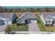 An aerial view showcases this single Gathering home's beautiful landscaping at 18851 Rawson St, Orlando, FL 32827