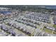 Expansive aerial view showcases a well-planned community with neatly arranged homes and inviting streets at 18851 Rawson St, Orlando, FL 32827