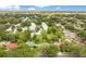 Overhead shot of a neighborhood with lush greenery showcasing the homes and surrounding trees at 2095 Curry Ln, Orlando, FL 32812