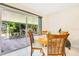 Cozy dining area featuring a round table, sliding glass doors to the outside and lots of natural light at 2095 Curry Ln, Orlando, FL 32812