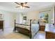 Comfortable main bedroom with natural light, tile flooring, and plenty of space at 2095 Curry Ln, Orlando, FL 32812