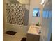 Well-maintained bathroom featuring a shower-tub combo and a vanity at 2208 San Vittorino Cir # 104, Kissimmee, FL 34741