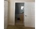 Bathroom doorway with view of vanity and shower-tub combo at 2208 San Vittorino Cir # 104, Kissimmee, FL 34741