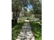 Landscaped community walkway with well-manicured lawns at 2208 San Vittorino Cir # 104, Kissimmee, FL 34741