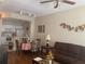 Cozy living room with open dining area and adjacent kitchen, perfect for entertaining at 2208 San Vittorino Cir # 104, Kissimmee, FL 34741