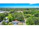 Aerial view of home in a lush neighborhood at 228 Ring Rd, Orlando, FL 32811