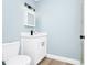 Bathroom showcasing updated vanity, fixtures, and lighting at 228 Ring Rd, Orlando, FL 32811