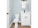 Bathroom showcasing updated vanity, fixtures, and lighting at 228 Ring Rd, Orlando, FL 32811