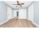 Bedroom with a ceiling fan and closet. Freshly painted and remodeled at 228 Ring Rd, Orlando, FL 32811