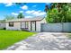 Charming single-story home with a well-manicured lawn and inviting curb appeal, perfect for a starter home at 228 Ring Rd, Orlando, FL 32811