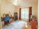 Office bedroom with modern furniture, bright natural light and carpet flooring at 2309 Edmonton Ct, Clermont, FL 34711