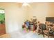 Office bedroom with modern furniture, bright natural light, carpet flooring, and vaulted ceilings at 2309 Edmonton Ct, Clermont, FL 34711