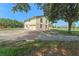 This exterior angle highlights the home's architectural details and large driveway at 2500 Derby Dr, Kissimmee, FL 34744