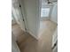Empty bedroom featuring hardwood floors, ceiling fan, and closet space at 3621 Atrium Dr # U-4, Orlando, FL 32822