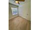 Bedroom featuring hardwood floors, ceiling fan and closet at 3621 Atrium Dr # U-4, Orlando, FL 32822