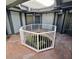 Interior courtyard with a white octagonal fence and tropical plants at 3621 Atrium Dr # U-4, Orlando, FL 32822