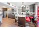 Spacious kitchen featuring granite countertops, stainless steel appliances, and red barstools at 3788 N Econlockhatchee Trl, Orlando, FL 32817