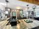 Stylish kitchen with granite countertops, stainless appliances, and pendant lighting over the island at 3788 N Econlockhatchee Trl, Orlando, FL 32817