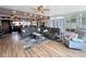 Comfortable living room with open layout, cozy seating, and access to other living areas at 3788 N Econlockhatchee Trl, Orlando, FL 32817
