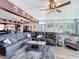 Cozy living room with comfortable seating, a ceiling fan, and an open floor plan at 3788 N Econlockhatchee Trl, Orlando, FL 32817