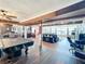 Open concept living space featuring a game room, kitchen, living room and sunroom all on one floor at 3788 N Econlockhatchee Trl, Orlando, FL 32817