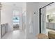Modern bathroom showcasing a spacious shower, a large mirror, and stylish decor elements at 4007 Marbury Ct, Davenport, FL 33837