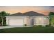 Inviting single-story home featuring a manicured lawn, two car garage and neutral color palette at 4007 Marbury Ct, Davenport, FL 33837