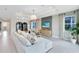Comfortable living room featuring stylish furniture, modern decor, and plenty of natural light at 4007 Marbury Ct, Davenport, FL 33837