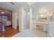 Bathroom featuring a glass shower, vanity area, and tile flooring at 4527 Sandhurst Dr, Orlando, FL 32817