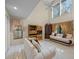 Bright living room with high ceilings, large windows, tile floors, and elegant furnishings at 4527 Sandhurst Dr, Orlando, FL 32817