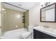 Clean bathroom with a shower-tub combo and a single vanity with plenty of counter space at 5071 Eaglesmere Dr # C01, Orlando, FL 32819