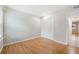 Bright bedroom features wood floors and a large closet for ample storage space at 5071 Eaglesmere Dr # C01, Orlando, FL 32819
