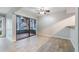 Tiled floor living room featuring a ceiling fan and view of the outdoors at 5071 Eaglesmere Dr # C01, Orlando, FL 32819