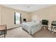 Neutral bedroom featuring a window with dark curtains and a ceiling fan at 510 Lobelia Dr, Davenport, FL 33837