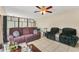 Relaxing living room with plush seating, modern decor, and ample space for entertaining at 510 Lobelia Dr, Davenport, FL 33837